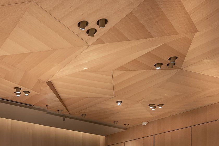 Origami-inspired ceiling featuring intricate geometric designs