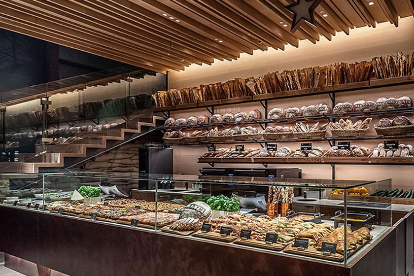 Princi Bakery in the Tokyo Roastery displaying a variety of breads, sandwiches, pastries and vegetables