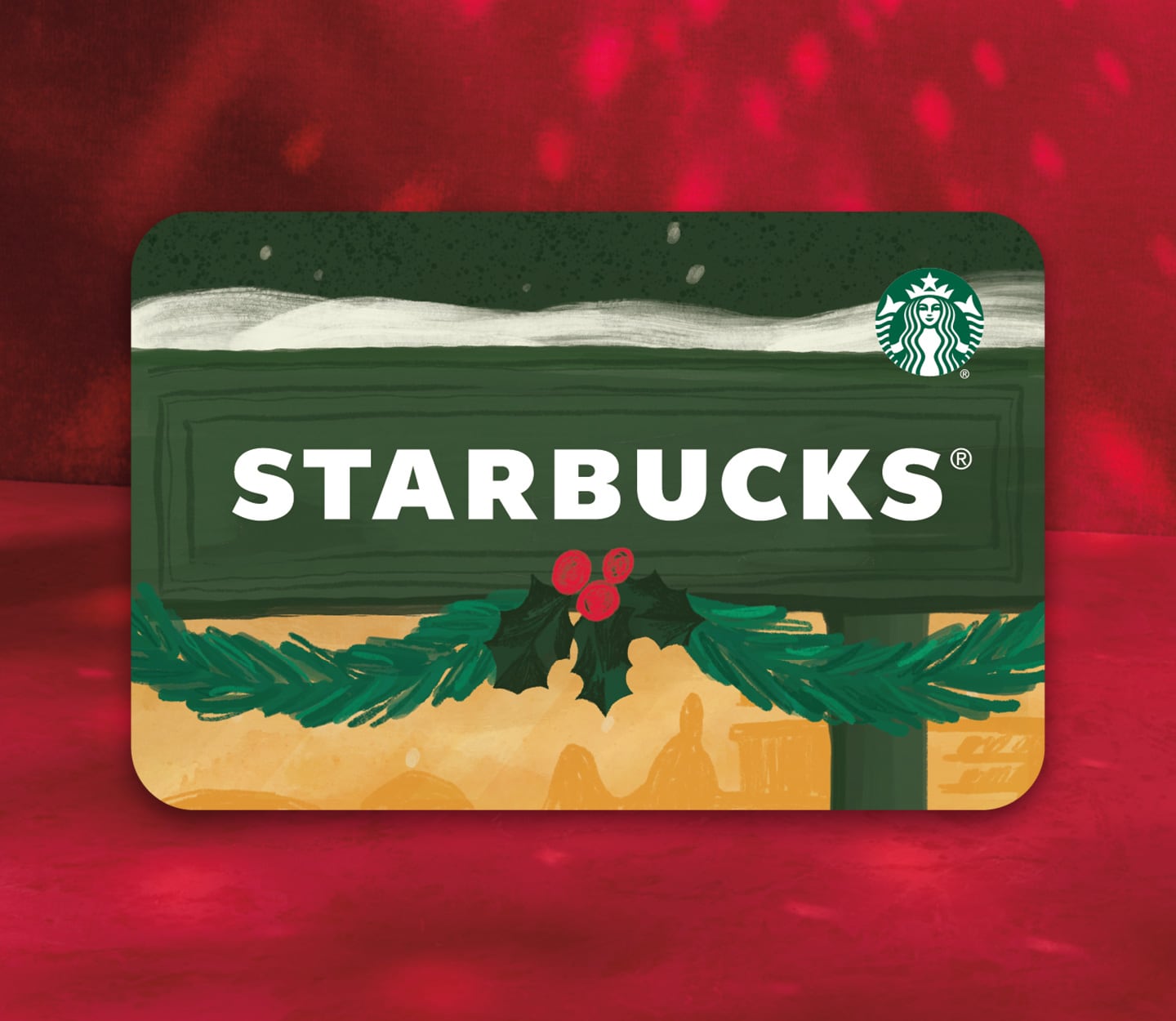 A gift card with an image of a sign with the word, “Starbucks” in the middle. There is snow on top of the sign and a garland on the bottom.