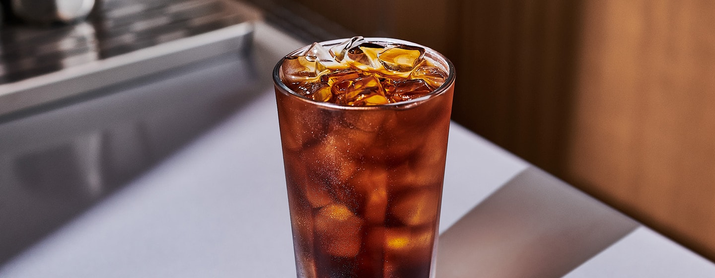 In iced coffee drink in a glass.