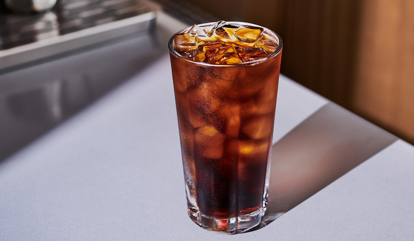 An iced coffee drink in a glass.