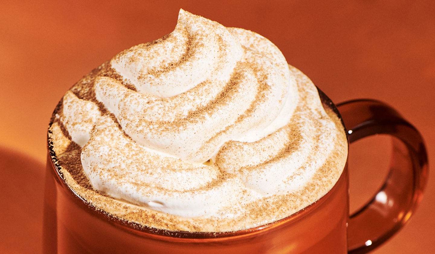 Close-up of a Pumpkin Spice Latte in a mug.