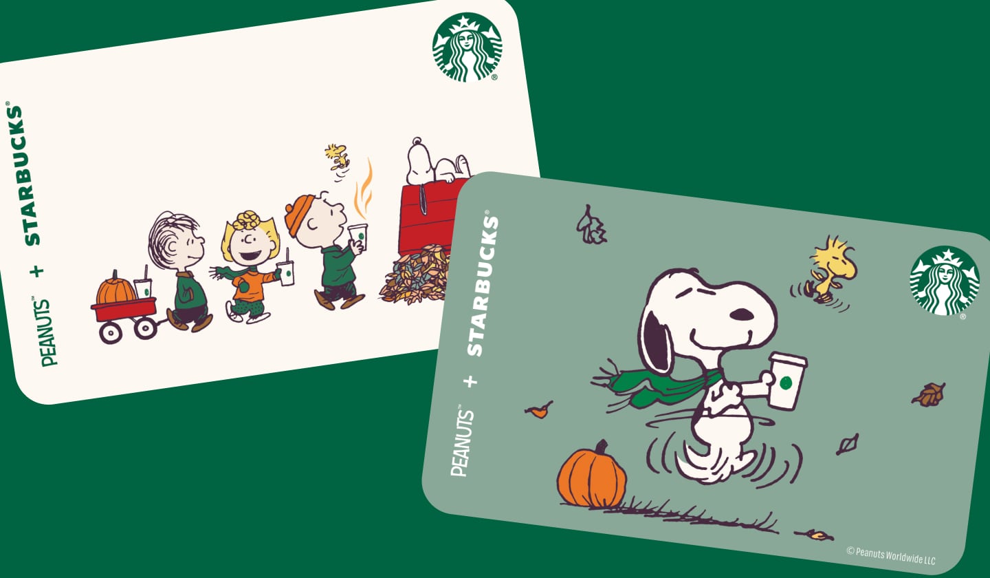 Two illustrated Peanuts™ branded Starbucks® gift cards.