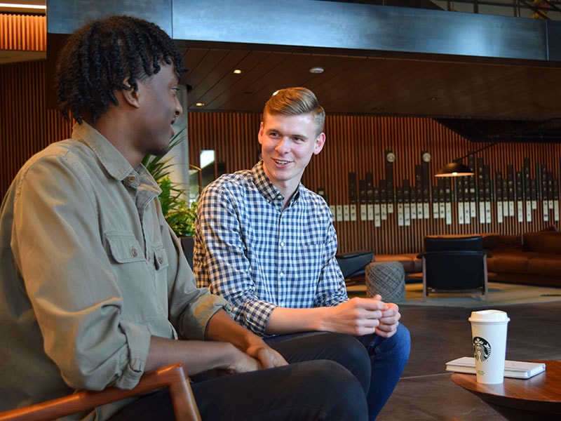 Starbucks interns having conversation