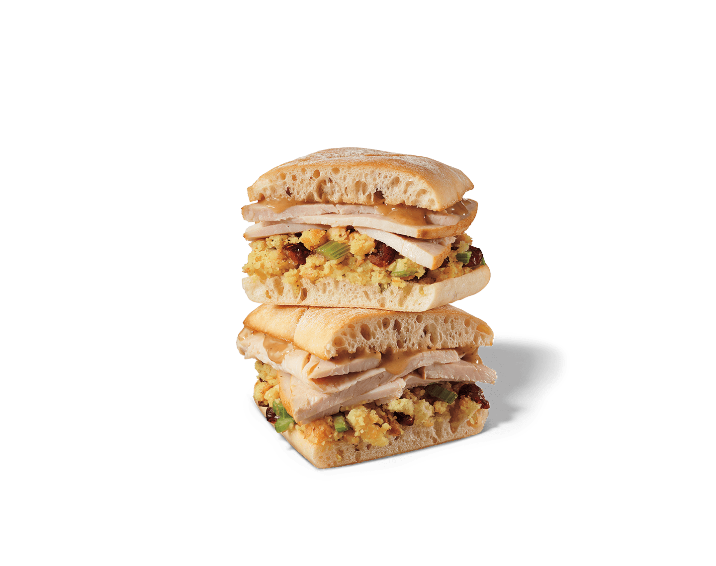 Sliced turkey breast, cranberry-herb stuffing and turkey gravy on toasted ciabatta bread.