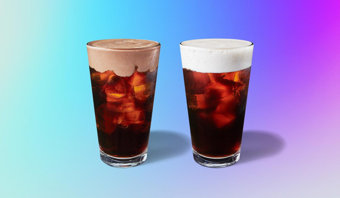Two coffee beverages side by side with foam topping