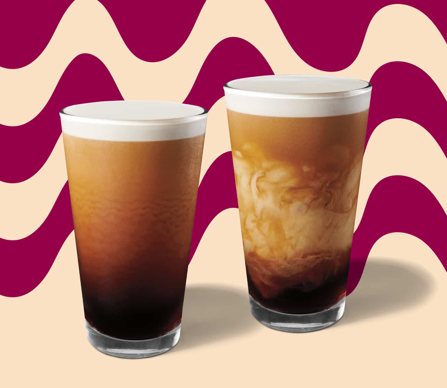 Two Nitro Cold Brew drinks served in glassware.