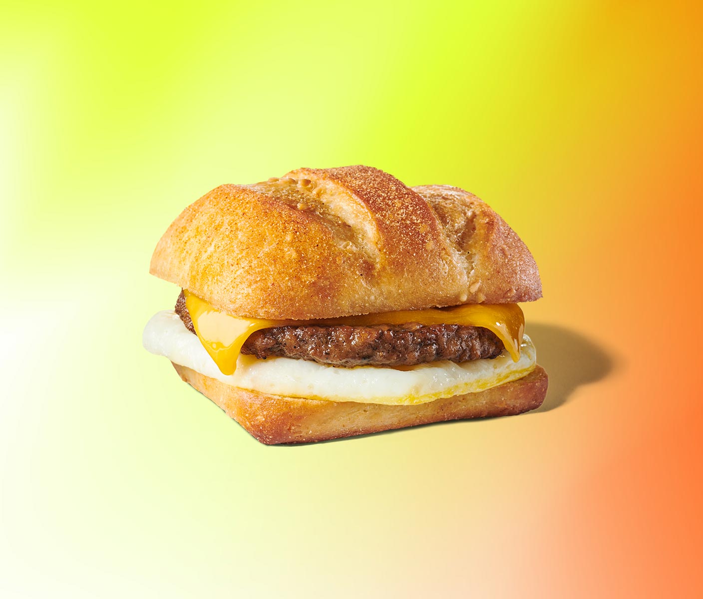 Breakfast sandwich with savory ingredients on ciabatta bread
