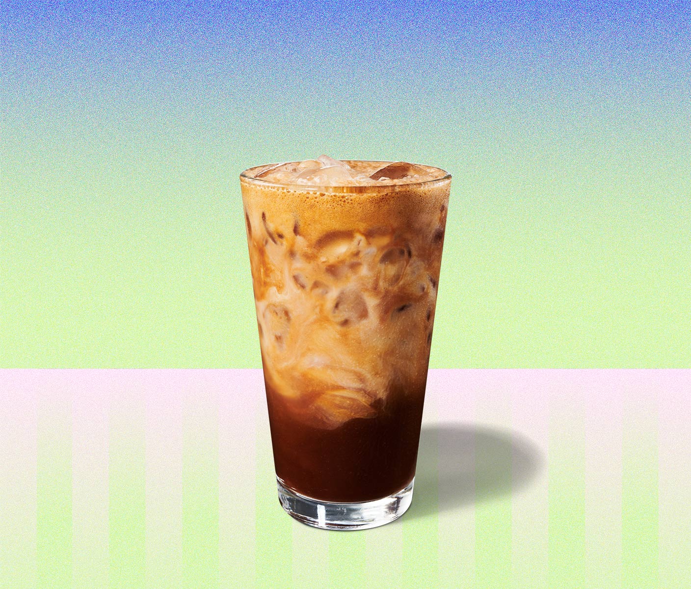 Marbled, iced espresso drink in a tall glass.