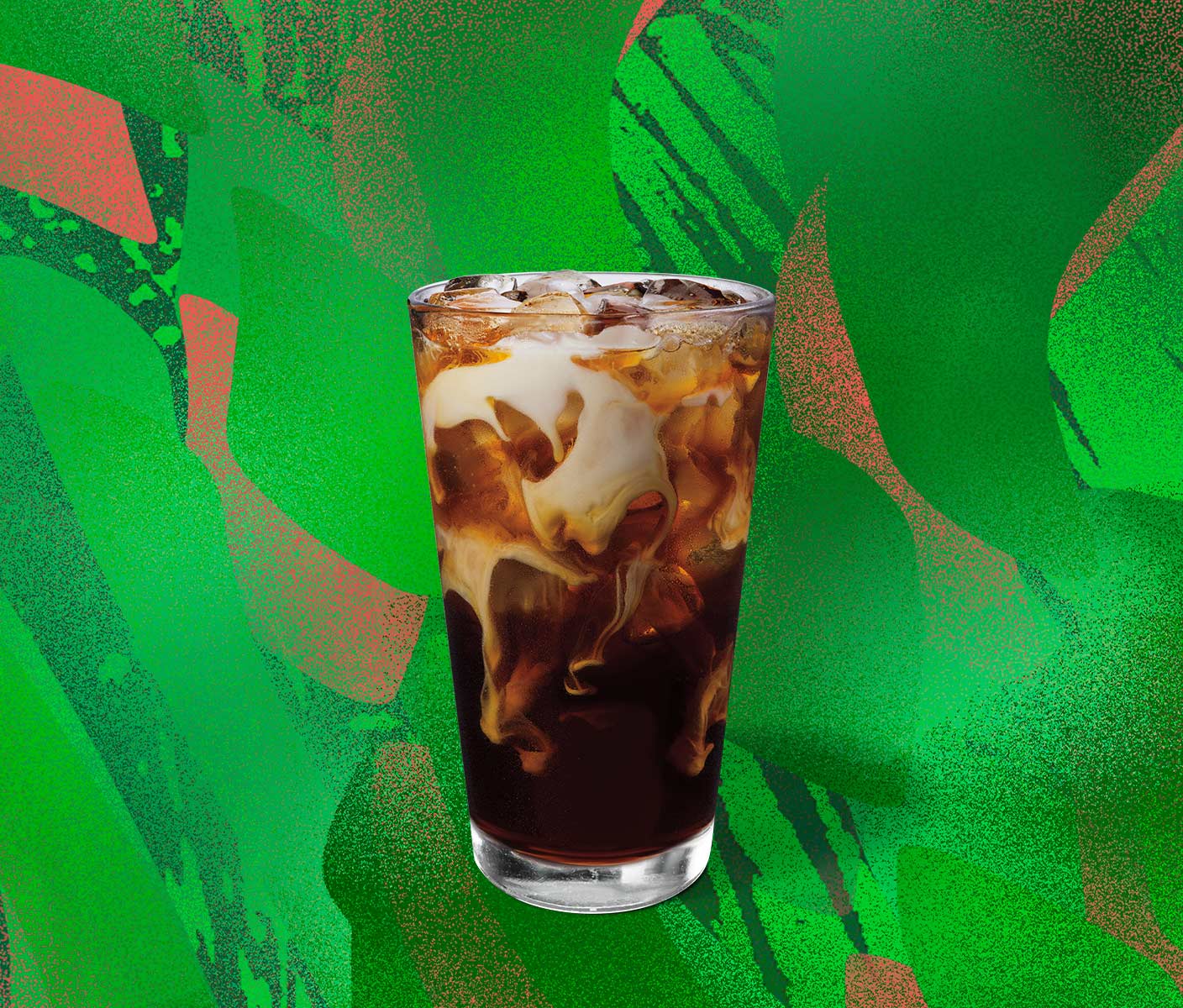 Marbled iced coffee drink in a tall glass.