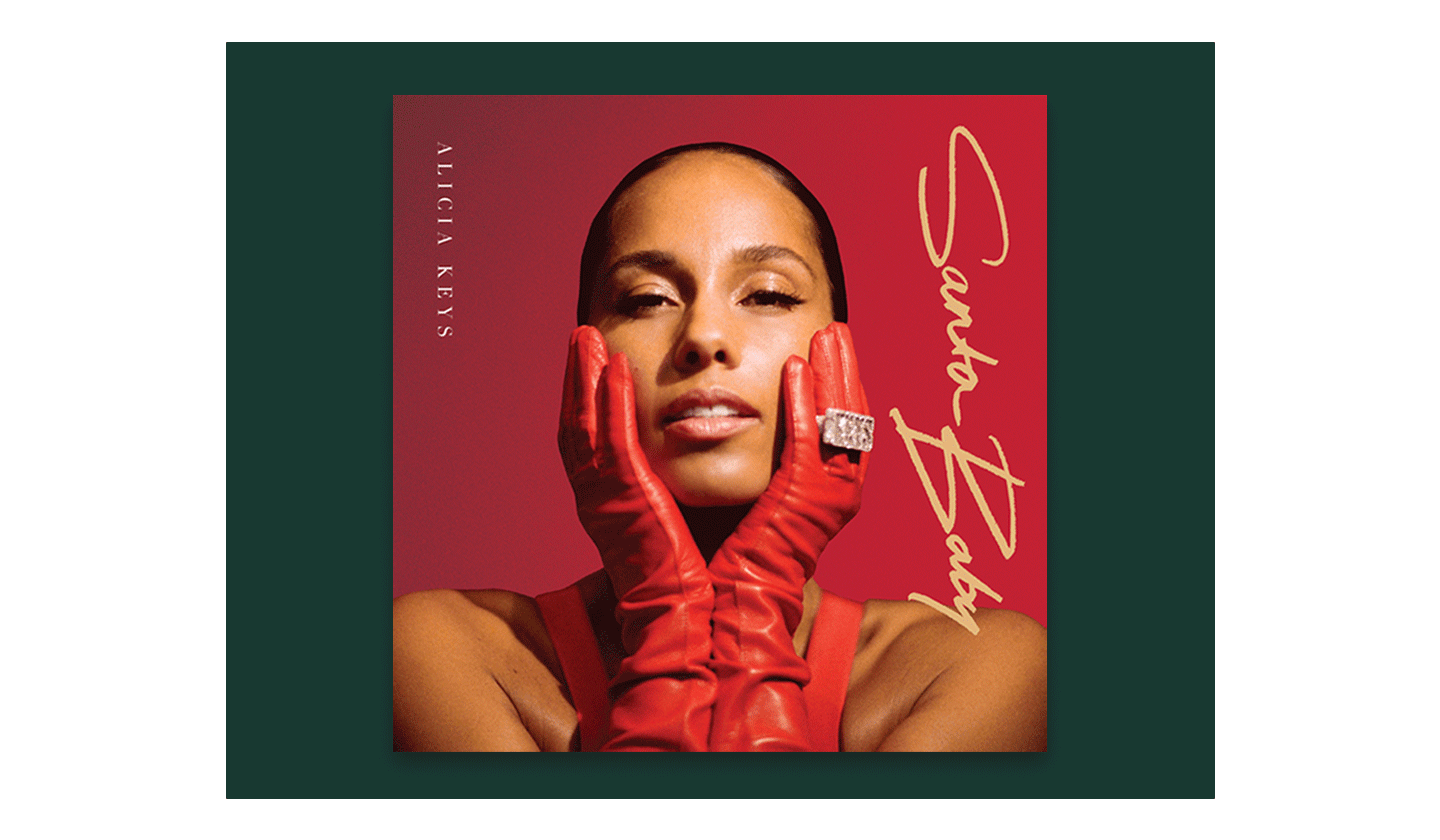 Alicia Keys' new holiday album art lays behind a festive red background.