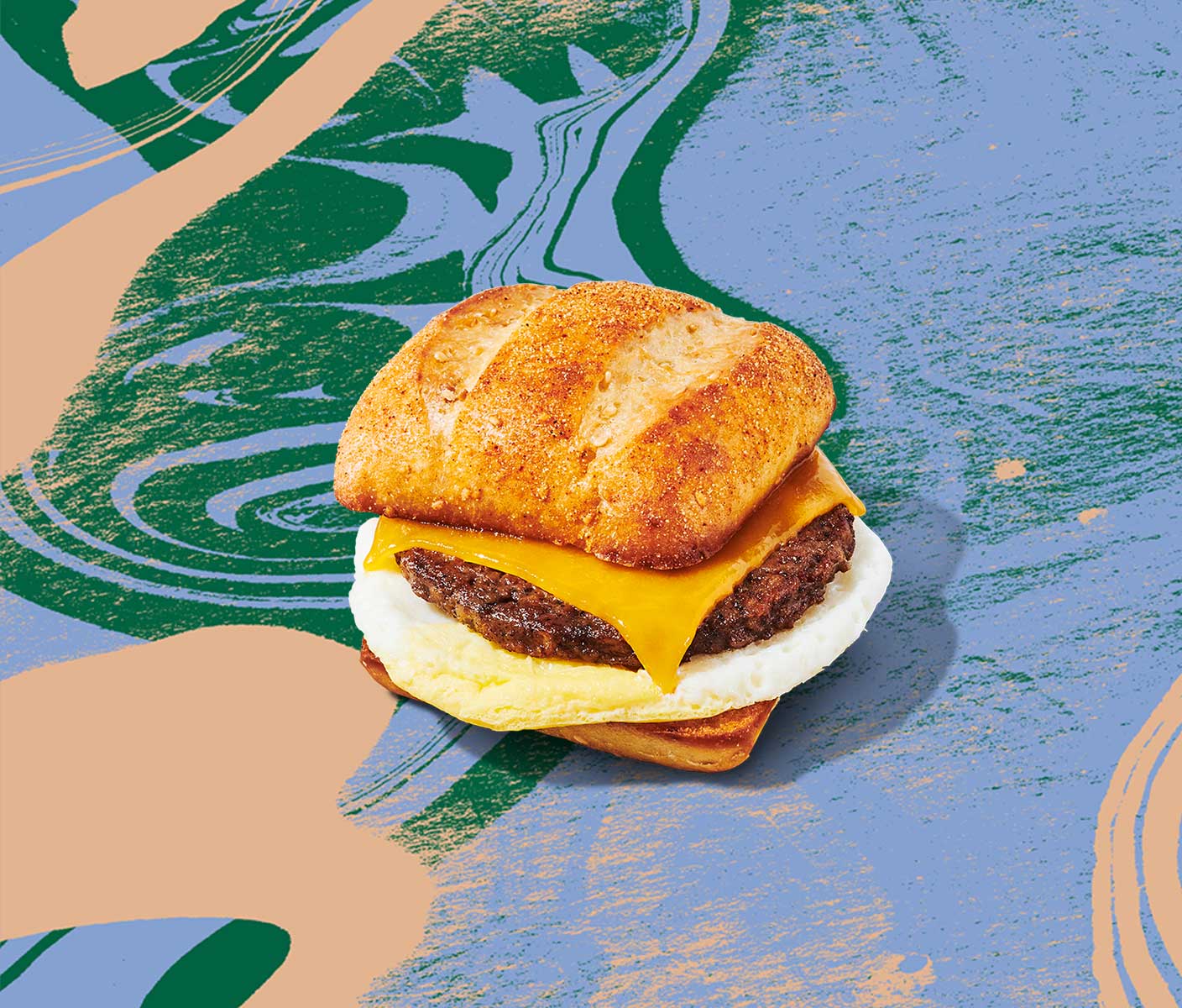 Meatless patty and slice of cheese between a ciabatta bun against a backdrop of swirly brushstrokes.