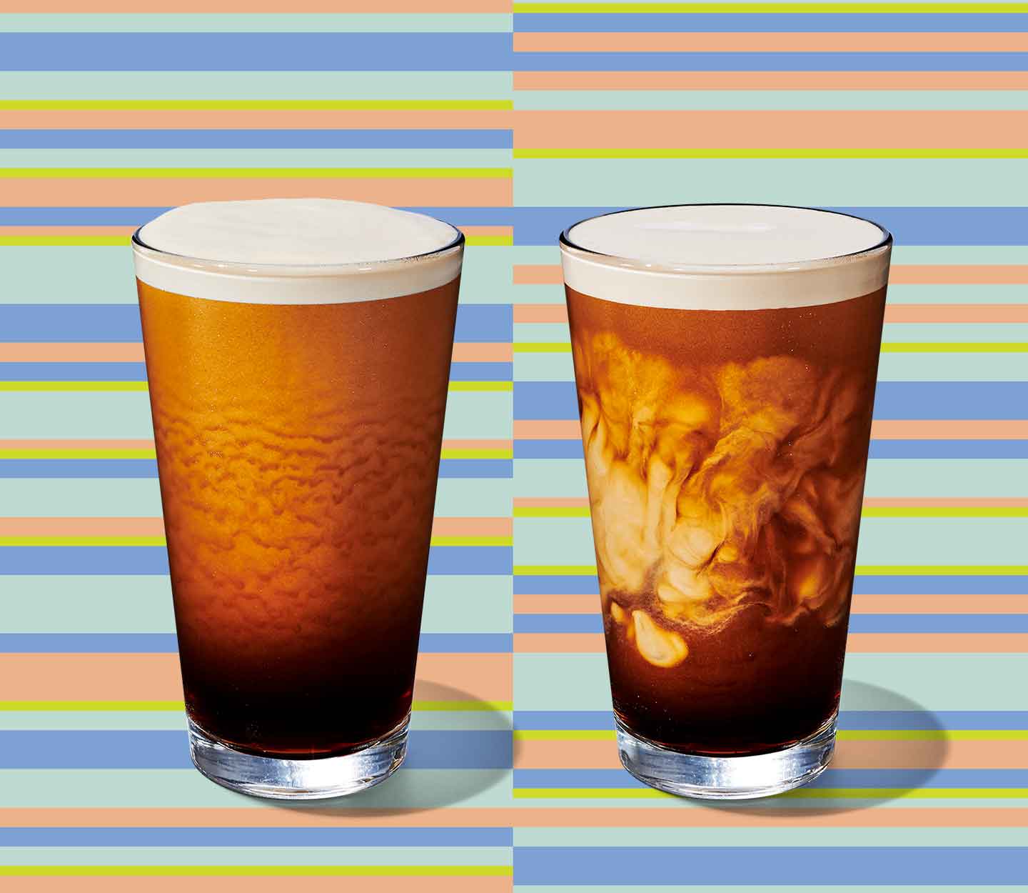 Two cold coffees side by side in glasses, both with a thick foam on top. The one on the right shows creamy marbling.
