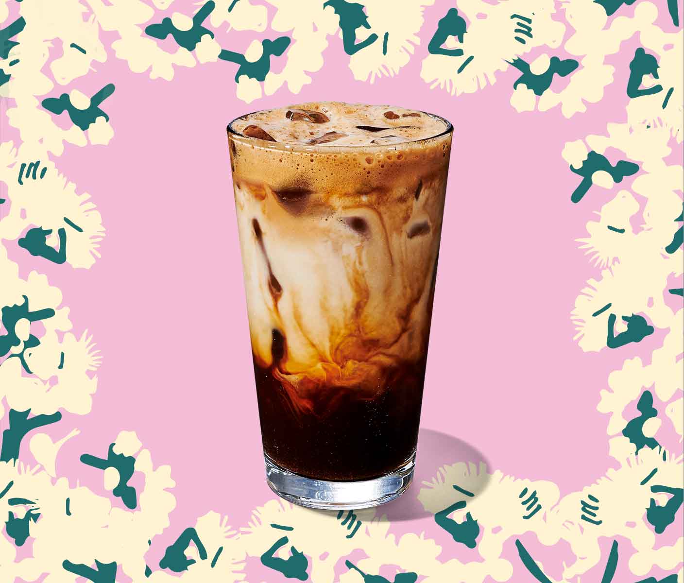Iced espresso drink with creamy layers in a tall glass.