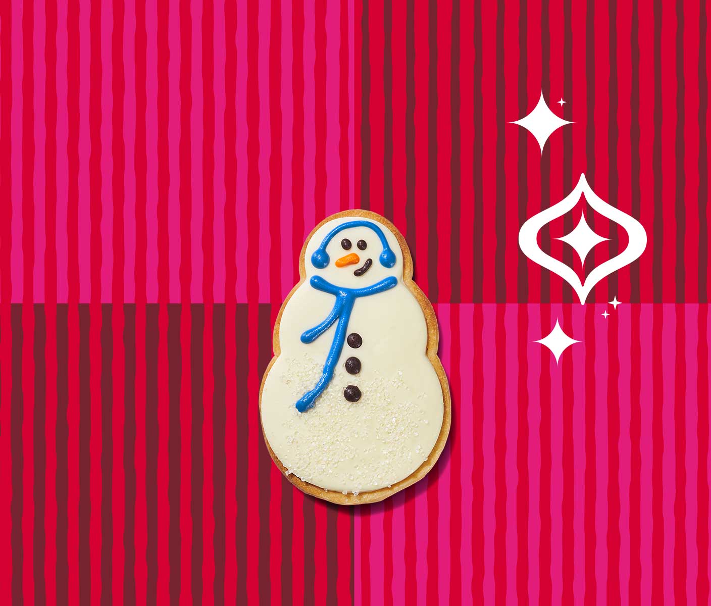 Snowman-shaped cookie, frosted and decorated to look like a snowman.