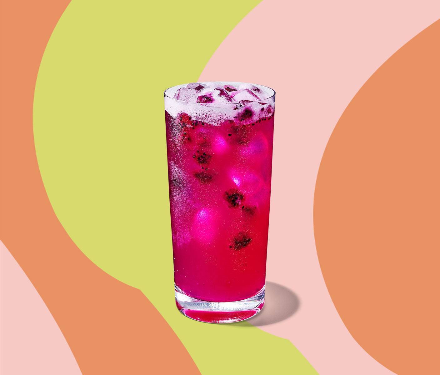 Magenta iced drink with dragonfruit inclusions.