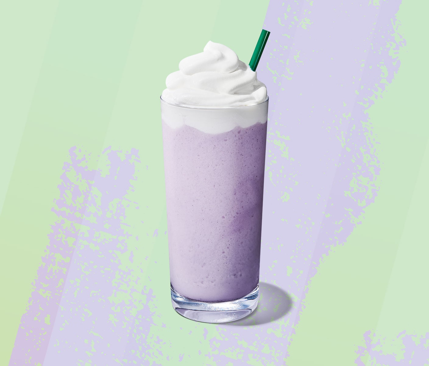 Lavender-hued blended drink with whipped cream.
