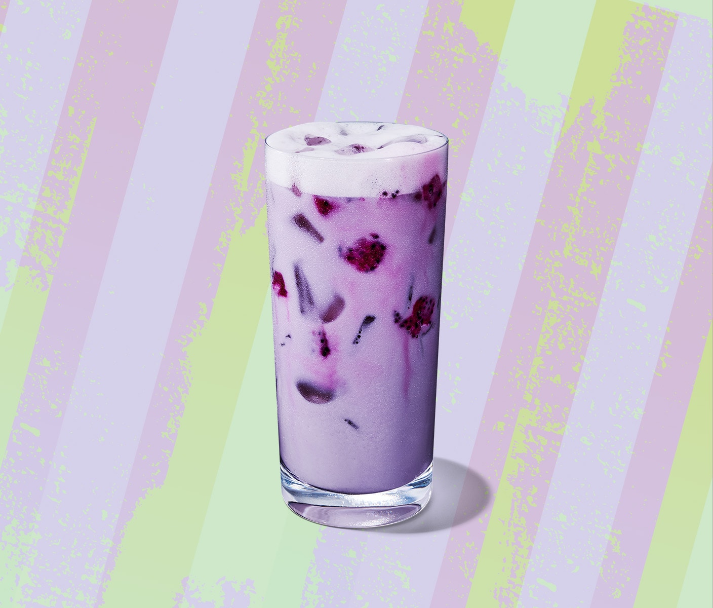 A creamy, light purple iced drink with pieces of dragonfruit.