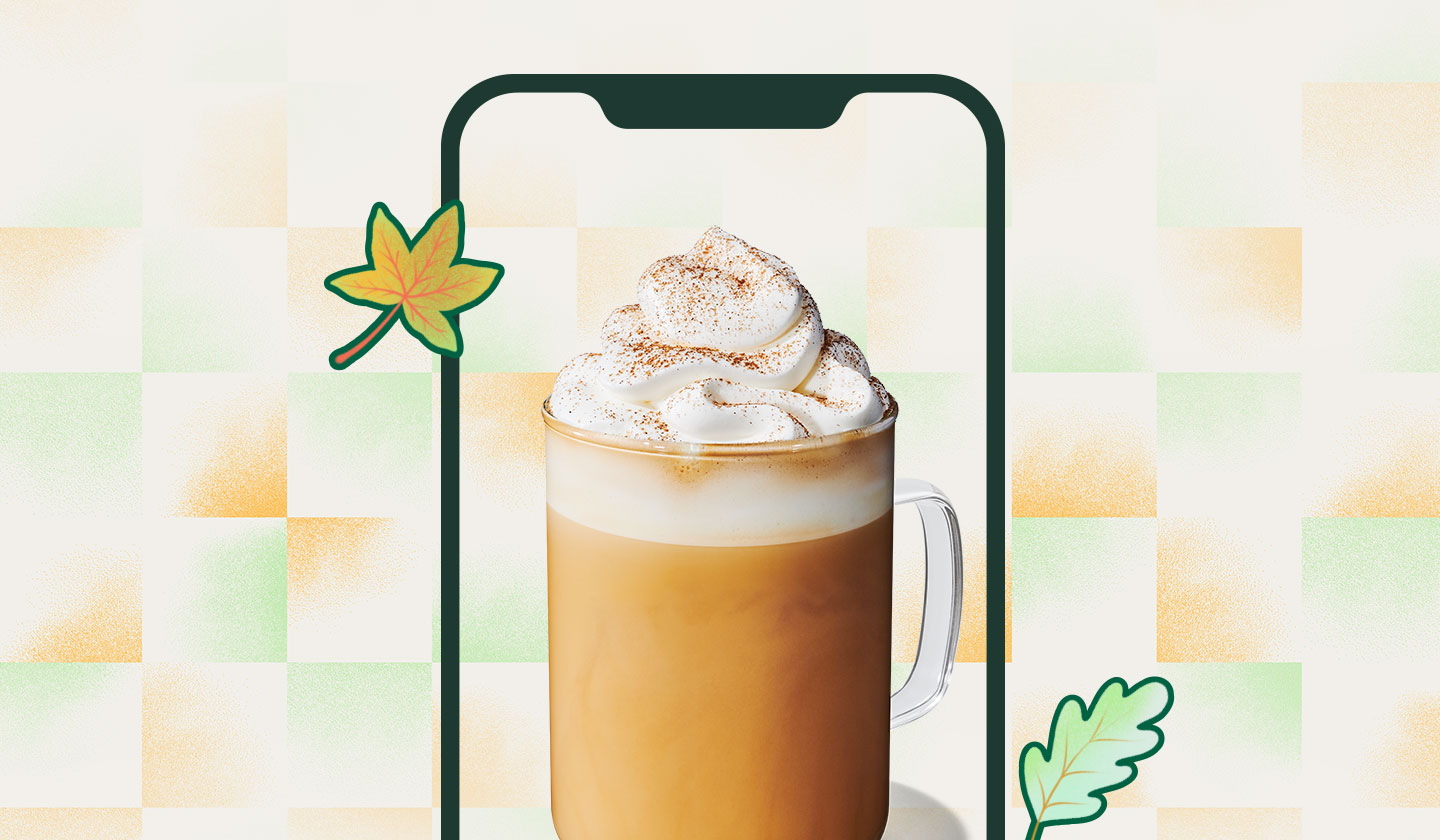 Pumpkin Spice Latte surrounded by leaves on a checkered background