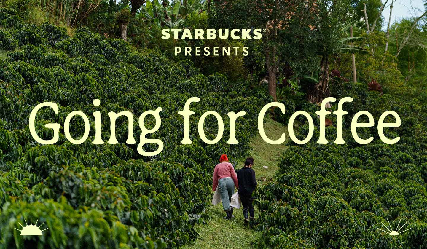 Two people walking through a lush coffee farm with text that reads Starbucks Presents Going for Coffee.​