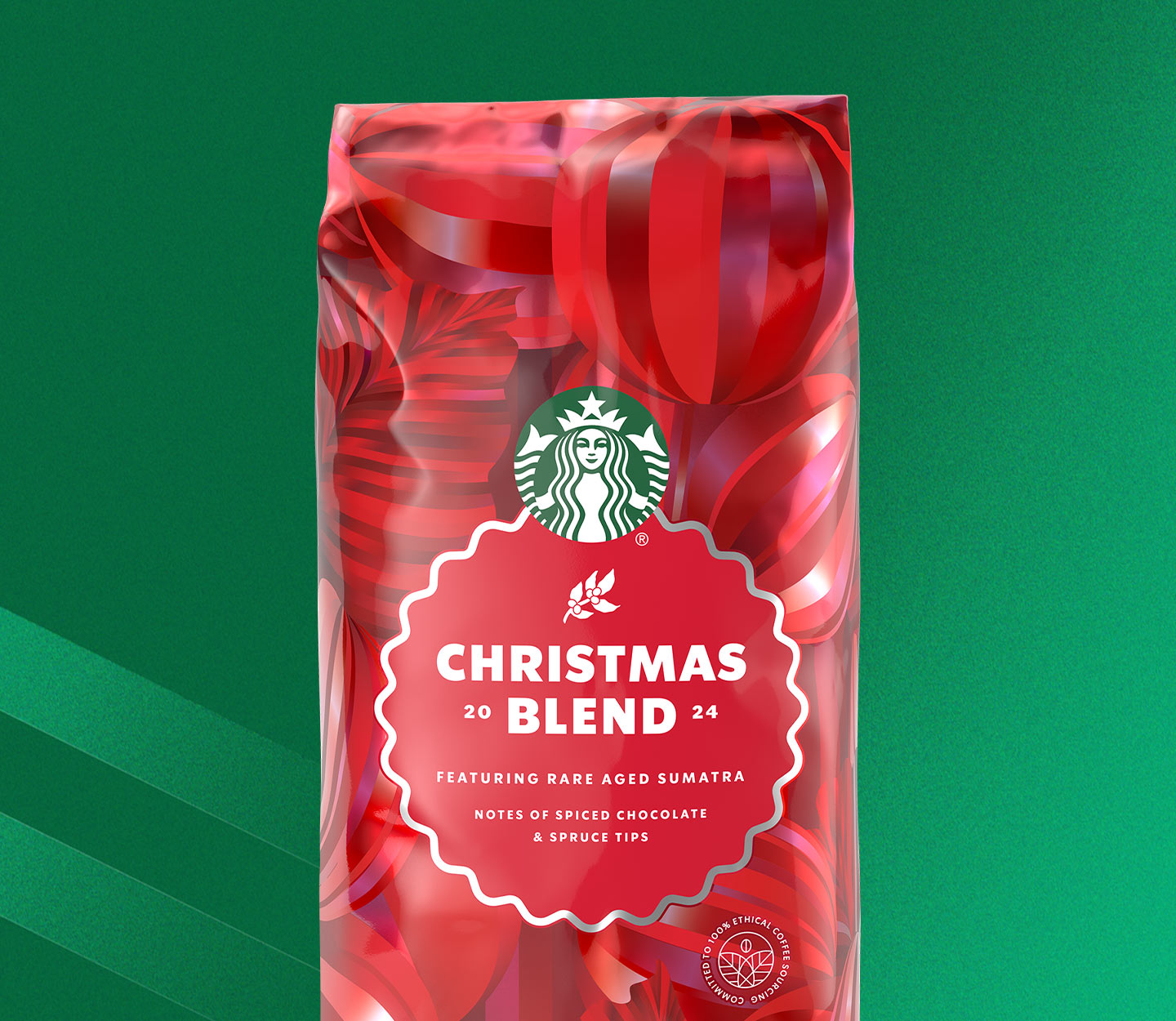 A festive, red bag of whole bean coffee that reads: Christmas Blend.