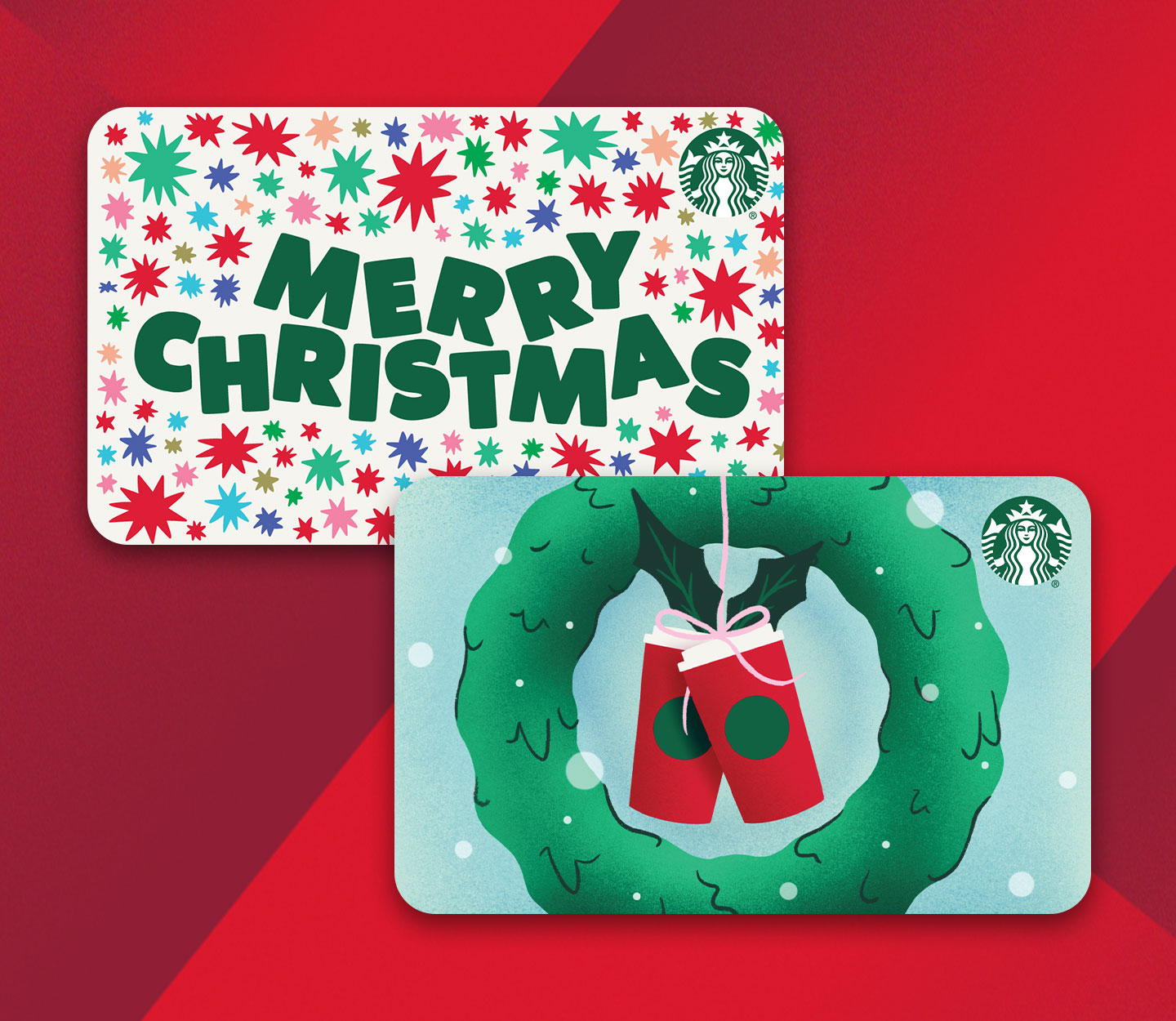 Two Starbucks gift cards, one with festive red and green stars and the words Merry Christmas and a second with a green wreath surrounding two red Starbucks cups.