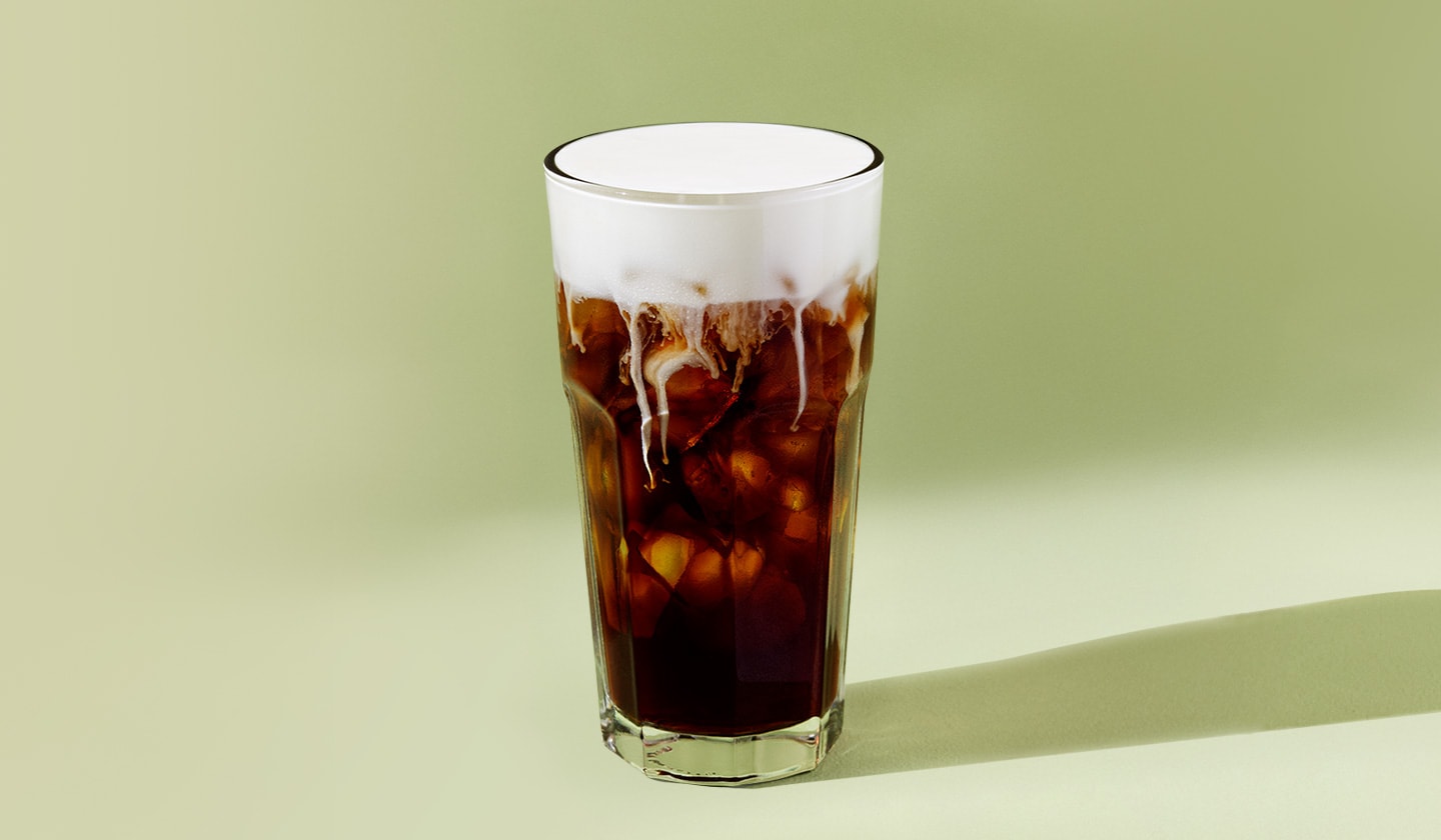 Salted Caramel Cream Cold Brew on a green background.