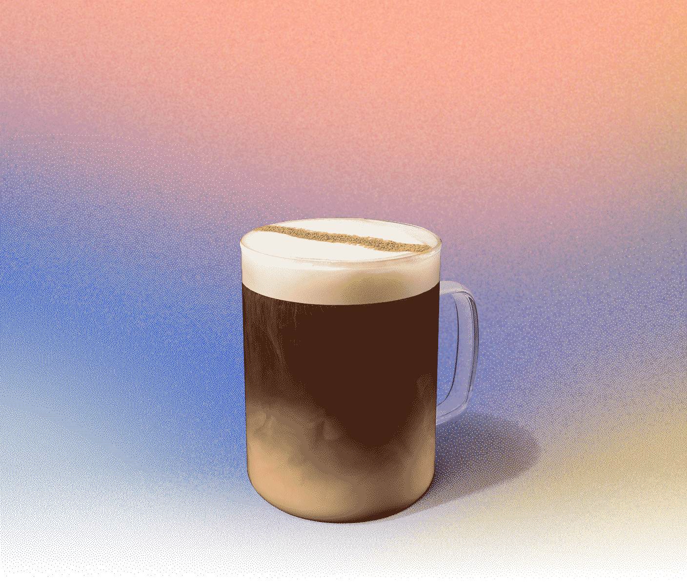 Hot coffee in a glass mug with foamy top