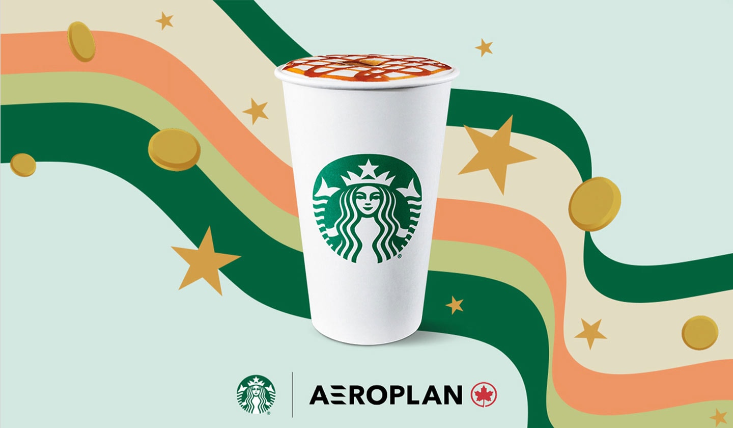 A Starbucks hot cup surrounded by stars and coins.