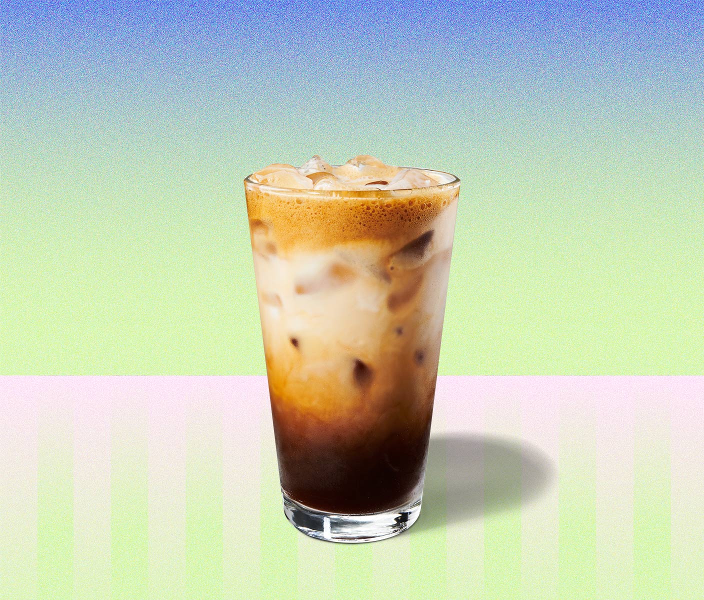 Marbled, iced coffee drink in a tall glass.