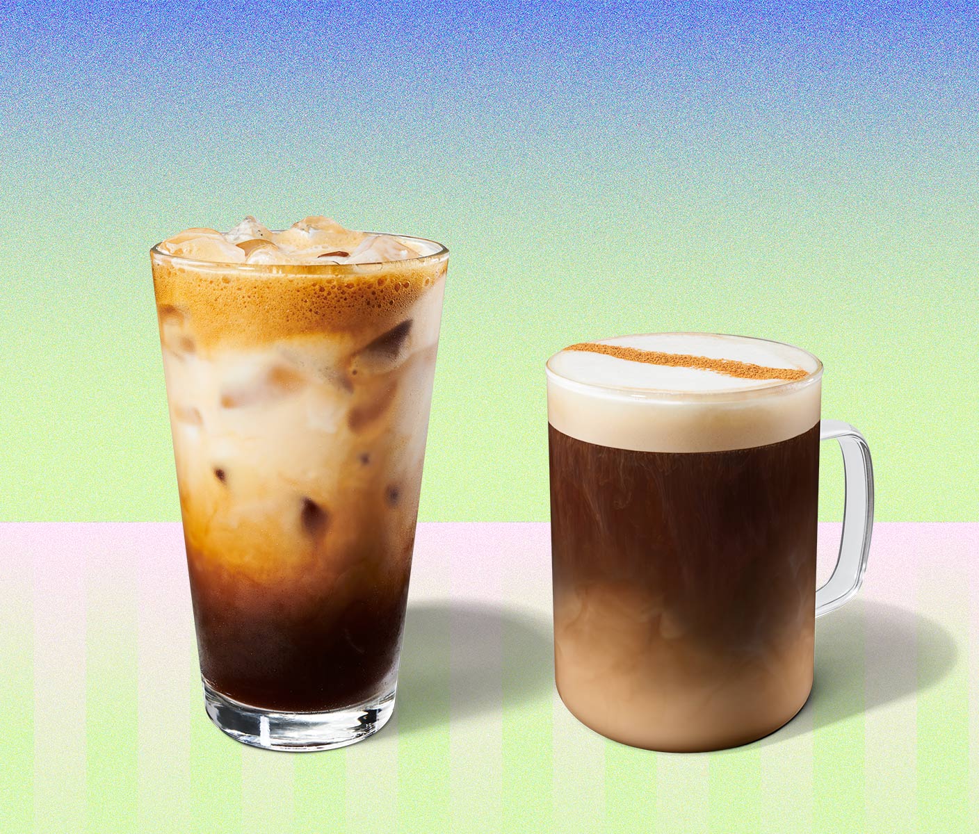 Marbled, iced coffee drink in a tall glass next to a hot coffee drink in a glass mug.