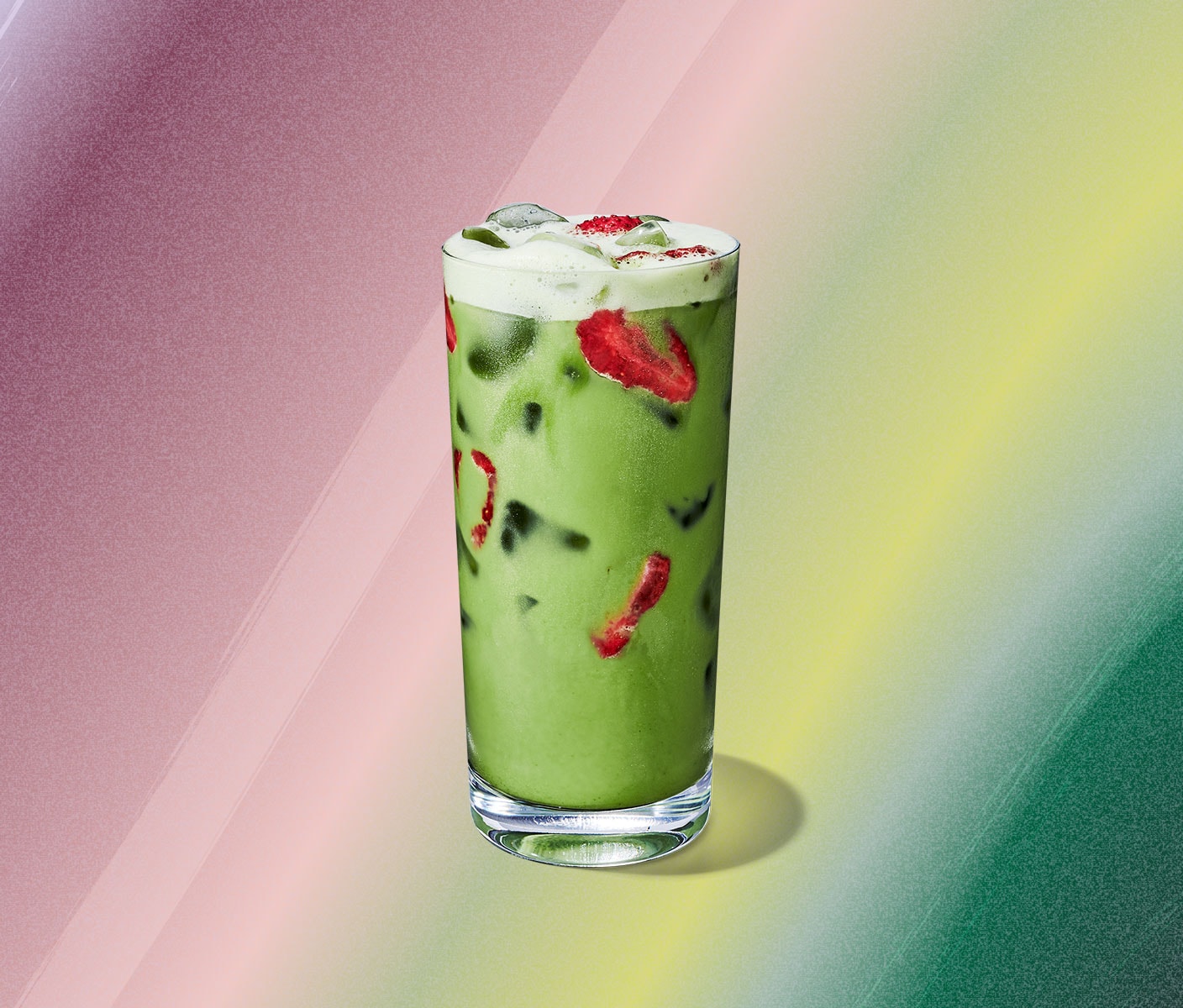 Iced green tea with strawberry inclusions.