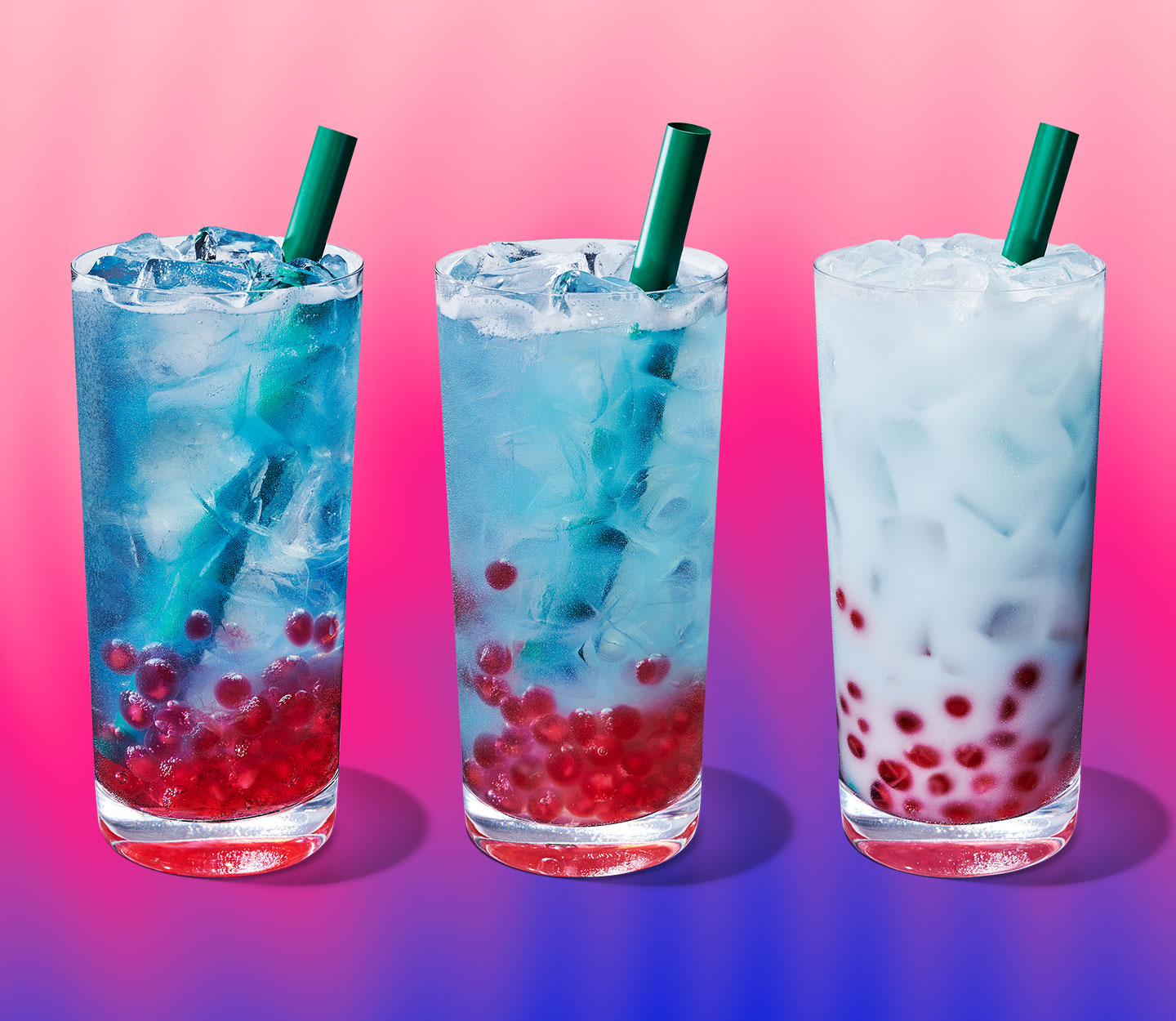 Three blue cold drinks with red pearls at the bottom. The shade of blue progresses from dark to creamy, one drink to the next.