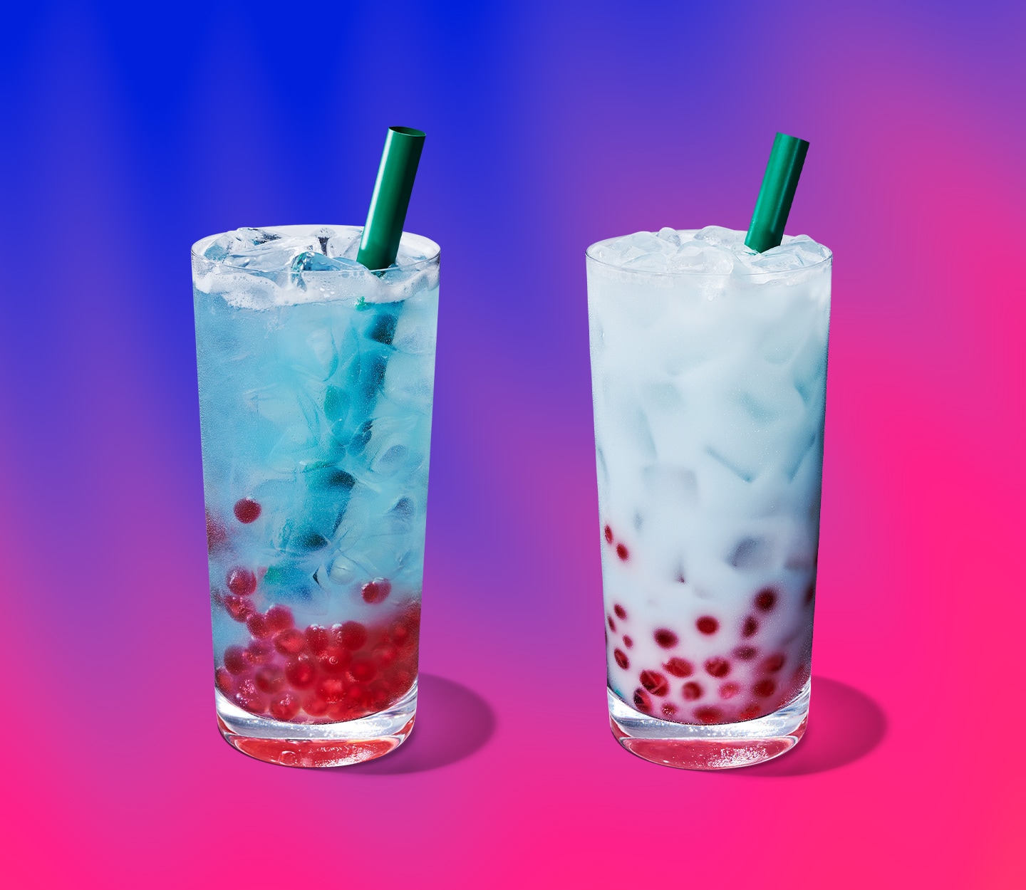 Two blue iced drinks with pink pearls at the bottom, the one on the right is creamy with coconut milk.