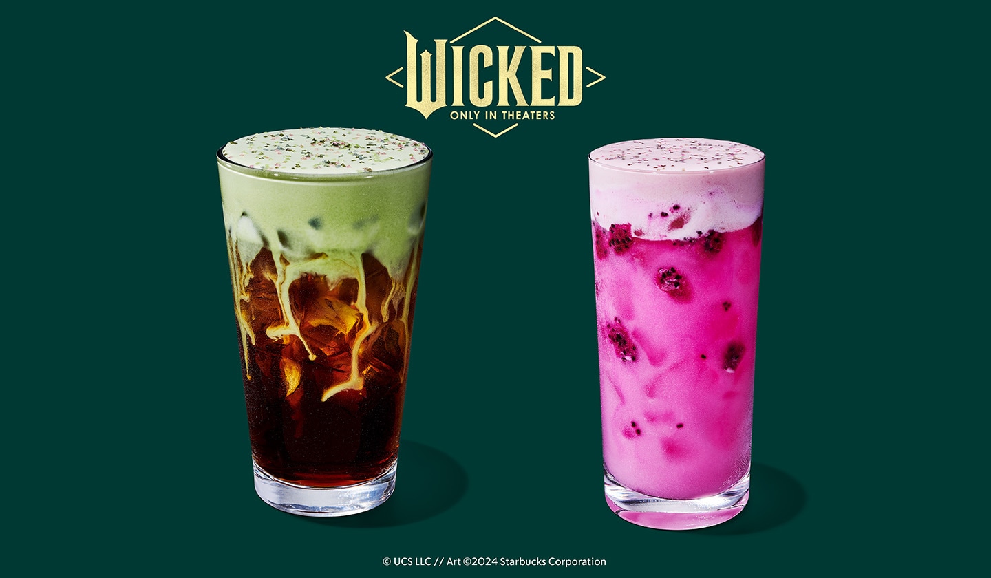 Two new WICKED-inspired Starbucks® drinks sit together on a green background with the WICKED logo.