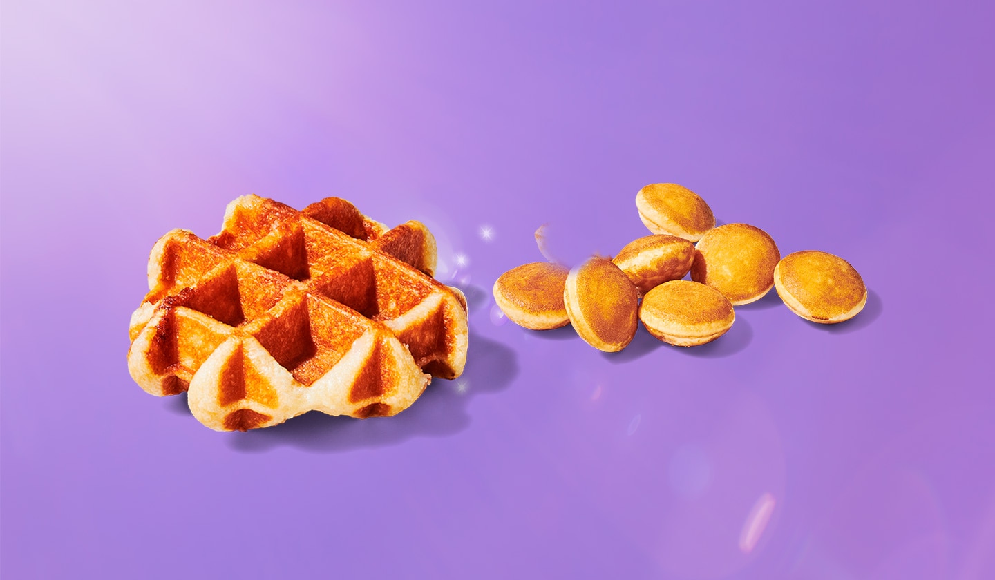 Waffle and mini pancake snacks on a pink background.