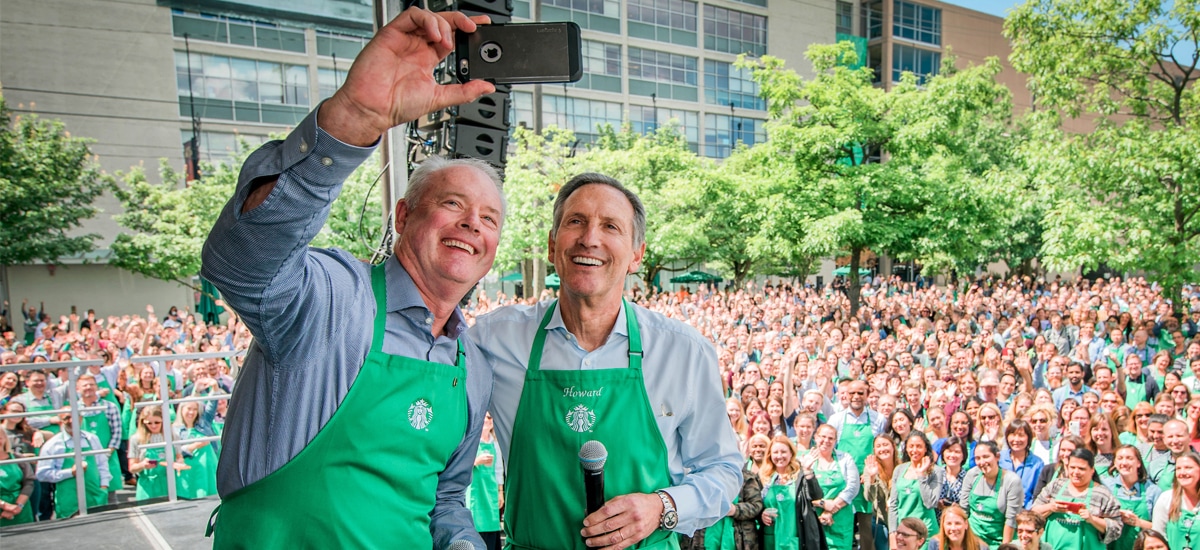 Howard Shultz and Kevin Johnson taking a selfie